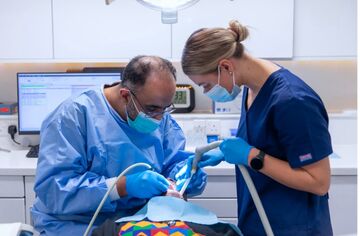 Surrey Docks Dental Practice dentists carrying out treatment